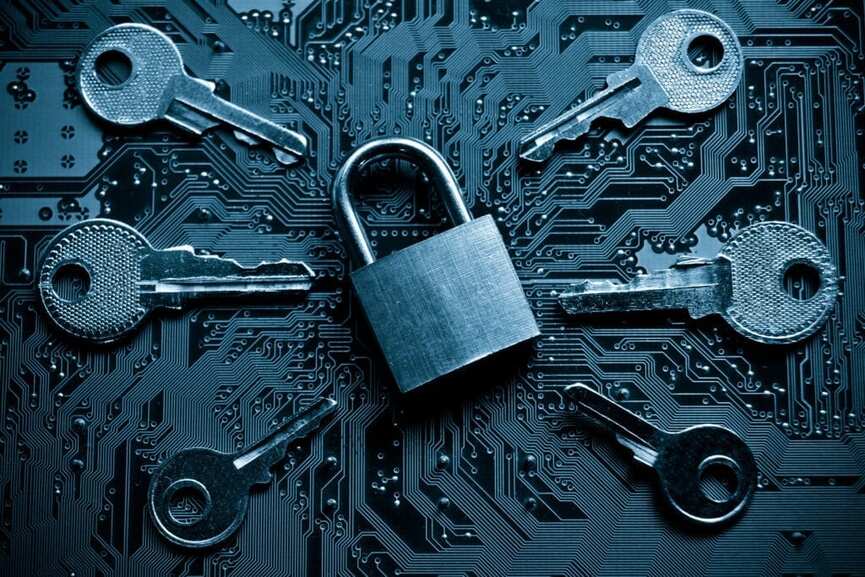 Padlock on a circuit board surrounded by keys, symbolizing a firewall.